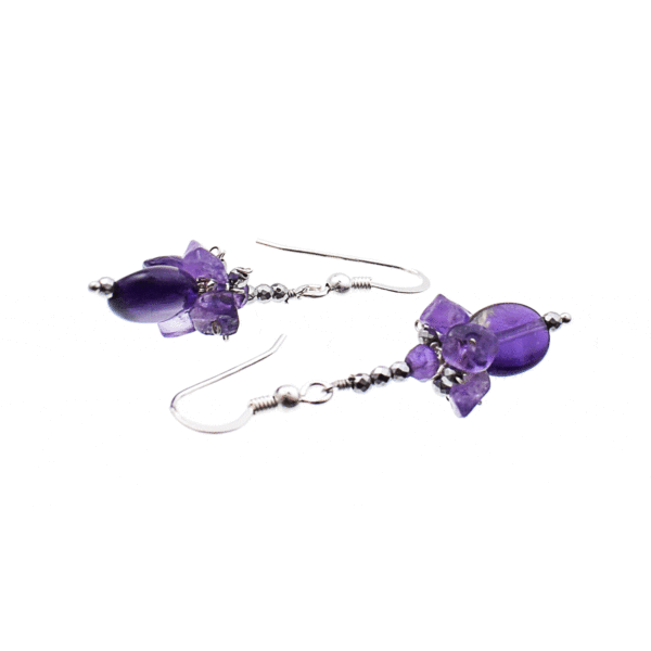 Handmade earrings made of natural amethyst and faceted hematite gemstones. The earrings have decorative elements made of silver 925. Buy online shop.