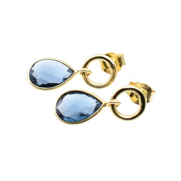 Handmade earrings made of gold plated sterling silver and natural faceted london blue topaz gemstone in a teardrop shape. Buy online shop.