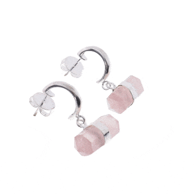 Handmade earrings made of natural rose quartz gemstone, in a cylindrical octahedral shape with double point and silver plated hypoallergenic metal. Buy online shop.