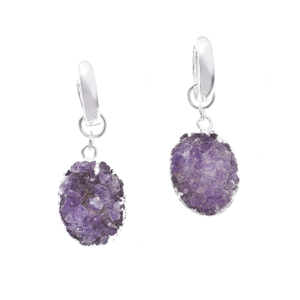 Handmade earrings made of natural, oval shaped amethyst gemstone, in crystal form and silver plated hypoallergenic metal. Buy online shop.