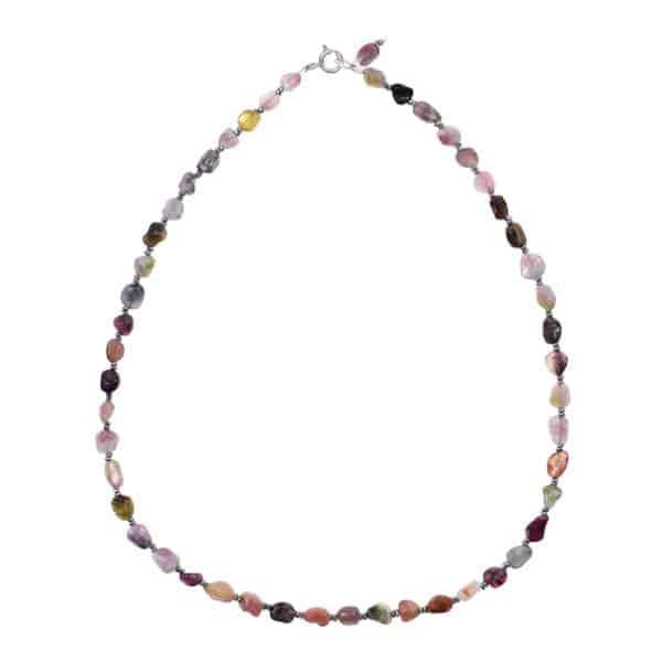 Handmade necklace made of sterling silver and natural pebble shaped tourmaline gemstones. The necklace is decorated with faceted hematite gemstone wheels. Buy online shop.