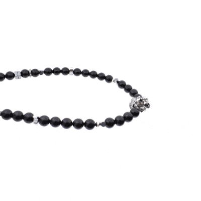 Handmade necklace made of natural black tourmaline and hematite gemstones with a silver lion's head in the center. The necklace has a clasp and decorative elements made of silver sterling. Buy online shop.