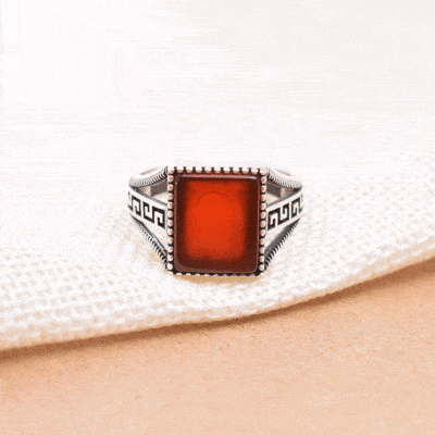 Handmade ring made of sterling silver and natural carnelian gemstone, in a square shape. Buy online shop.
