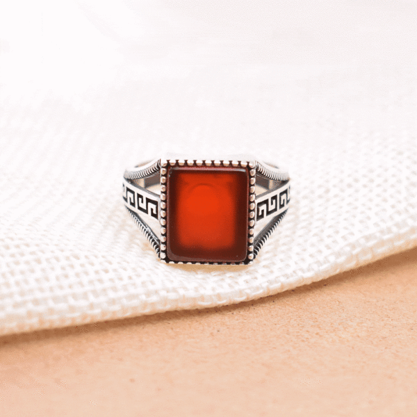 Handmade ring made of sterling silver and natural carnelian gemstone, in a square shape. Buy online shop.