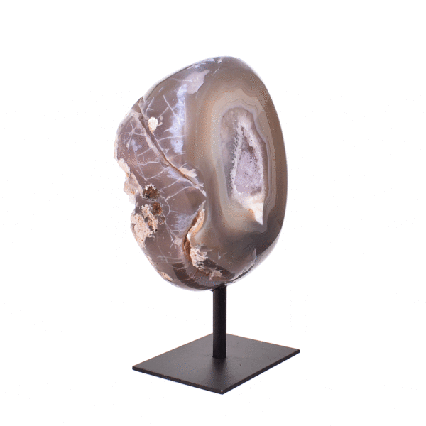 Natural agate geode gemstone with crystal quartz, embedded into a black metallic base. The product has a height of 15cm.  Buy online shop.
