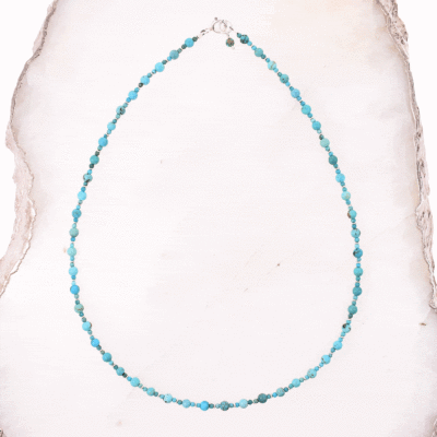 Handmade necklace made of natural, spherical turquoise gemstones and sterling silver decorative elements. Buy online shop.