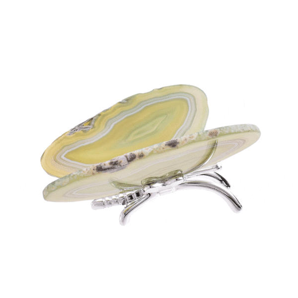 Butterfly with body made of silver plated metal and wings made of polished slices of natural green agate stone. The butterfly has a size of 10m.