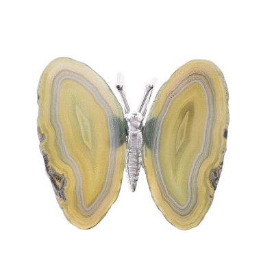 Butterfly with body made of silver plated metal and wings made of polished slices of natural green agate stone. The butterfly has a size of 10m.