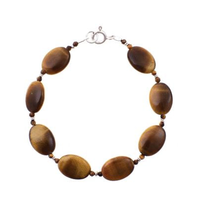 Handmade bracelet made of natural tiger's eye gemstones in an oval and spherical shape, with decorative sterling silver elements. Buy online shop.