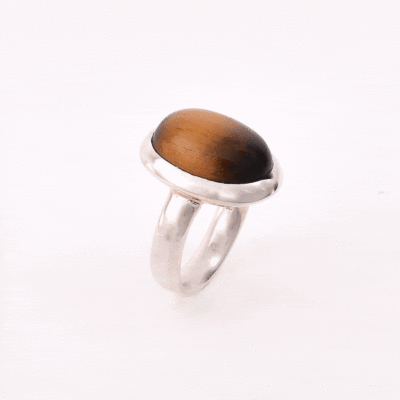 Handmade ring made of sterling silver and natural tiger's eye gemstone in an oval shape. Buy online shop.