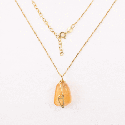Handmade wiring setting pendant made of natural citrine quartz gemstone and gold plated sterling silver. The pendant is threaded on an adjustable gold plated sterling silver chain. 