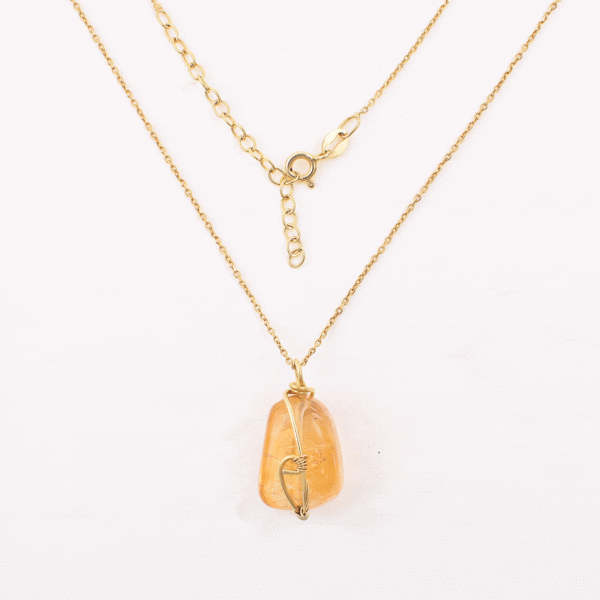 Handmade wiring setting pendant made of natural citrine quartz gemstone and gold plated sterling silver. The pendant is threaded on an adjustable gold plated sterling silver chain. 