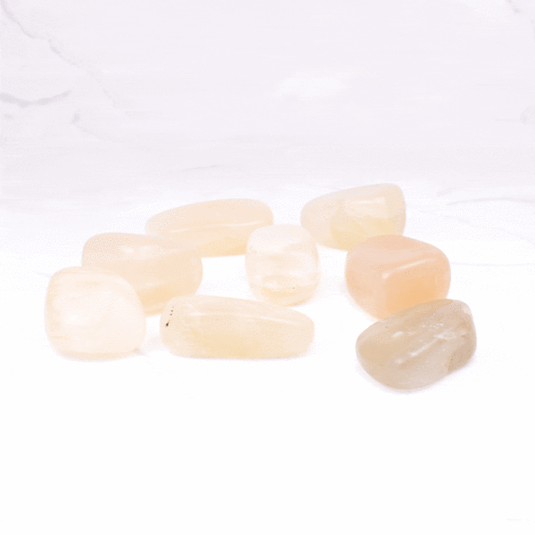Natural tumbled moonstone gemstones, ranging from 2cm to 3cm. Buy online shop.