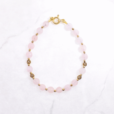 Handmade bracelet with natural, spherical shaped morganite and pyrite gemstones and gold plated sterling silver elements.