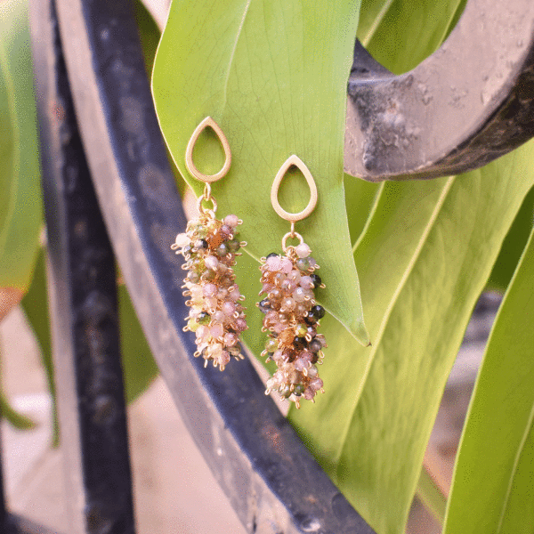 Handmade earrings made of natural, faceted, multicolored tourmaline gemstones and gold plated sterling silver. 