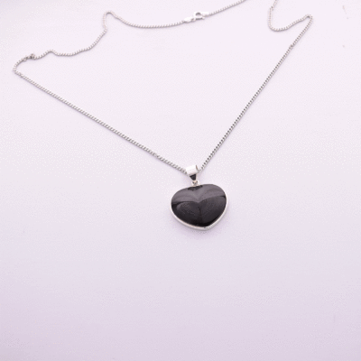 Handmade sterling silver necklace of natural, heart-shaped rainbow obsidian gemstone. 