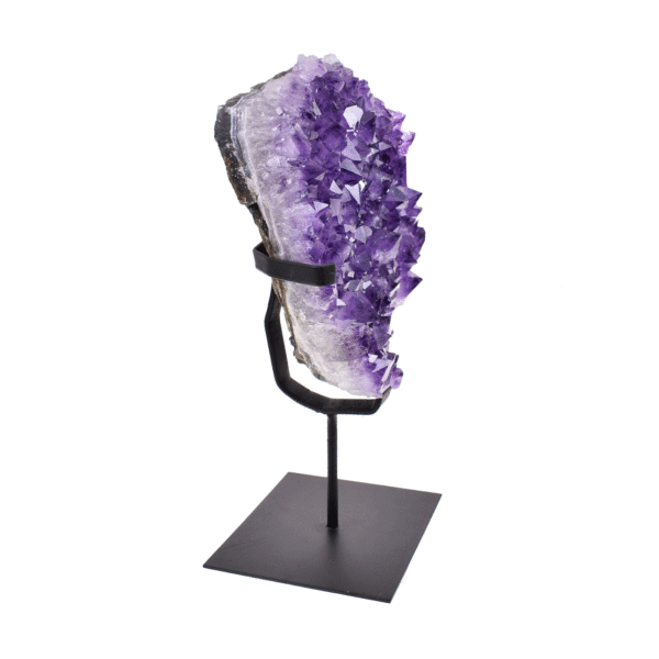 Raw 23cm piece of natural amethyst gemstone. The Amethyst comes with a black, metallic base.