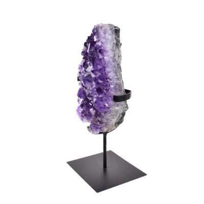 Raw 23cm piece of natural amethyst gemstone. The Amethyst comes with a black, metallic base.