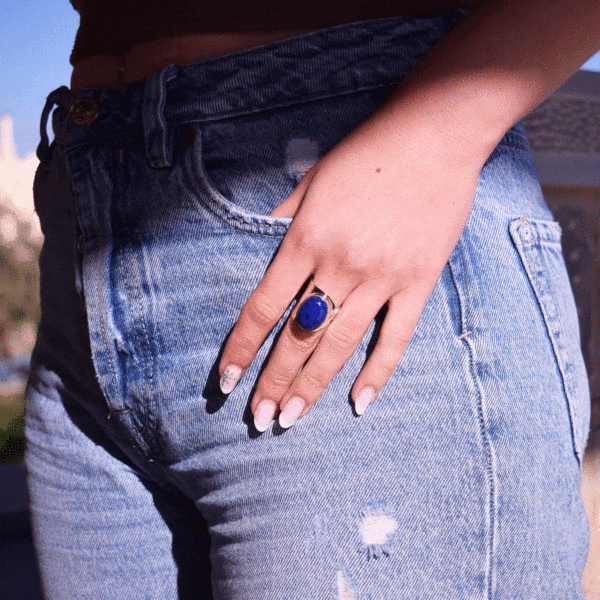 Handmade sterling silver ring with natural, oval shaped lapis lazuli gemstone. The size of the ring is adjustable. 