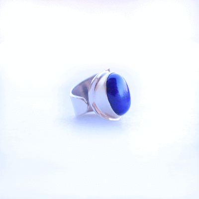 Handmade sterling silver ring with natural, oval shaped lapis lazuli gemstone. The size of the ring is adjustable. 