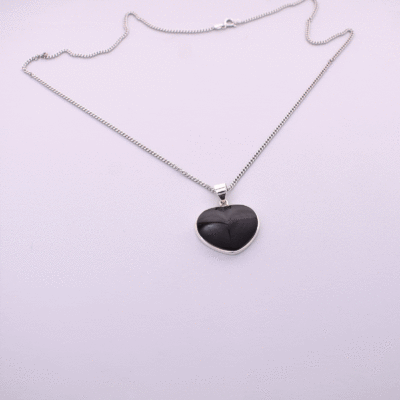 Handmade sterling silver necklace of natural, heart-shaped rainbow obsidian gemstone. 