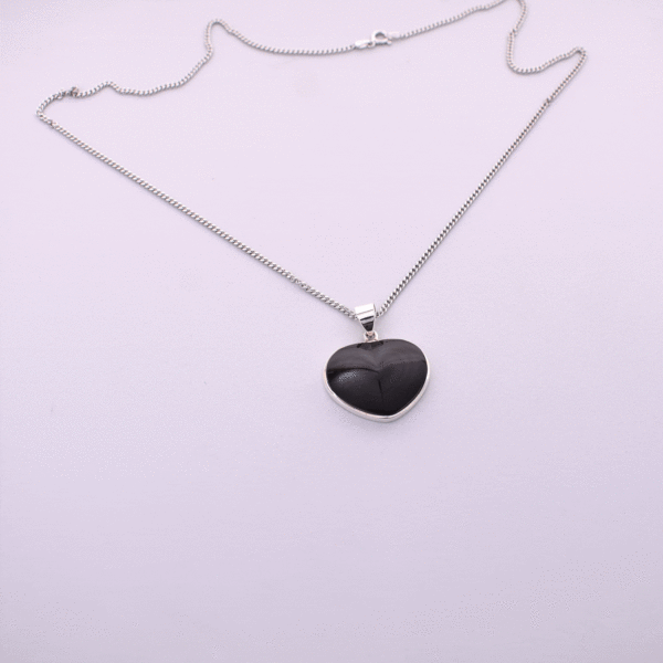 Handmade sterling silver necklace of natural, heart-shaped rainbow obsidian gemstone. 