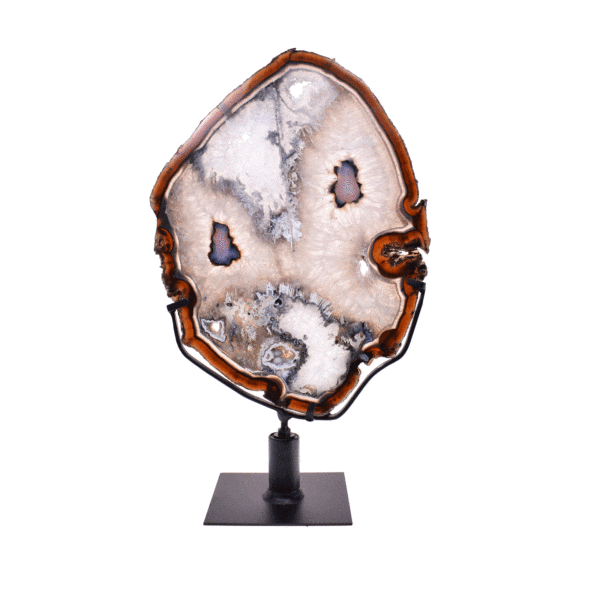 Thin, polished slice of natural agate gemstone with crystal quartz formations from Brazil, in warm earthy tones. Mounted on a black rotating metal base, this elegant piece stands 37cm tall.