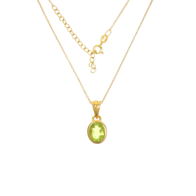 Handmade necklace made of natural Peridot stone in an oval shape and gold-plated sterling silver. The length of the chain is adjustable and it ranges from 40cm (minimum) until 45cm (maximum).
