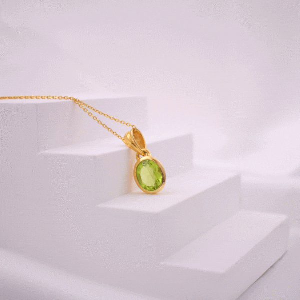 Handmade necklace made of natural Peridot stone in an oval shape and gold-plated sterling silver. The length of the chain is adjustable and it ranges from 40cm (minimum) until 45cm (maximum).
